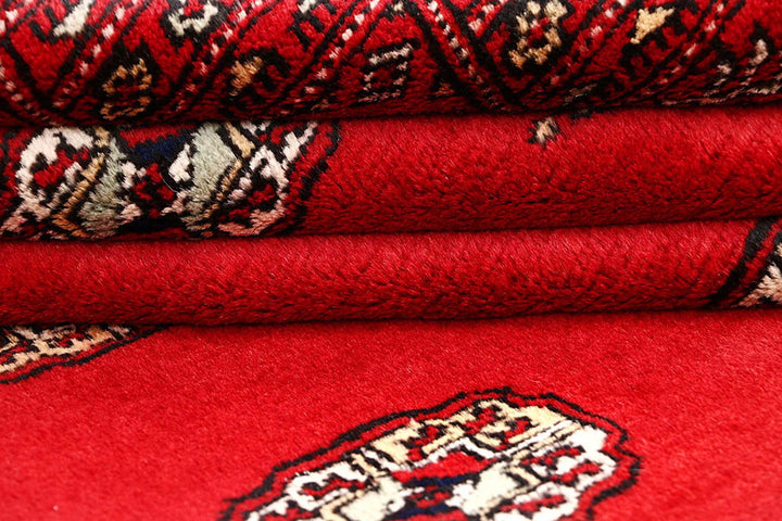 Red Pakistani Bokhara Rug 4' 2" x 6' 1" Hand-Knotted | No. QA32084