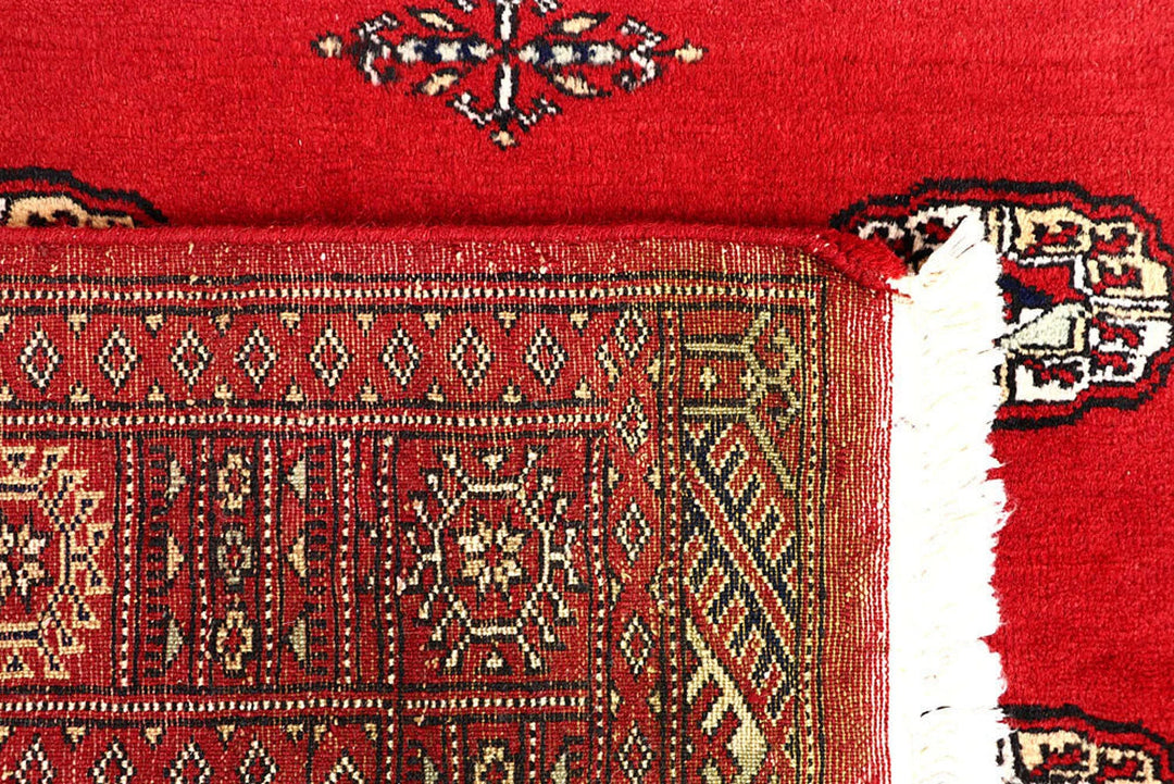 Red Pakistani Bokhara Rug 4' 2" x 6' 1" Hand-Knotted | No. QA32084