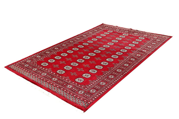 Firebrick Red Pakistani Bokhara Rug 5' 5" x 8' 5" Hand-Knotted | No. QA32596