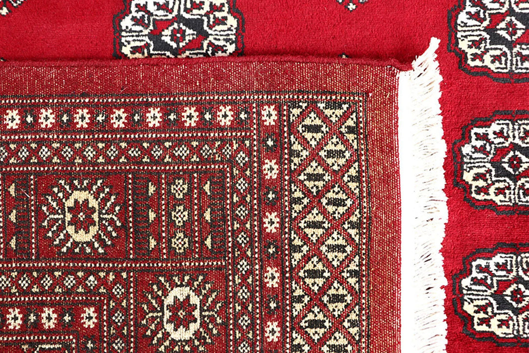 Firebrick Red Pakistani Bokhara Rug 5' 5" x 8' 5" Hand-Knotted | No. QA32596