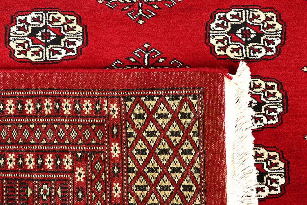 Red Pakistani Bokhara Rug 9' 3" x 12' 4" Hand-Knotted | No. QA32748