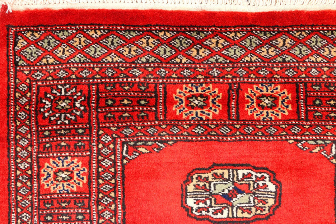 Red Pakistani Bokhara Rug 2' 8" x 12' Hand-Knotted | No. QA32867