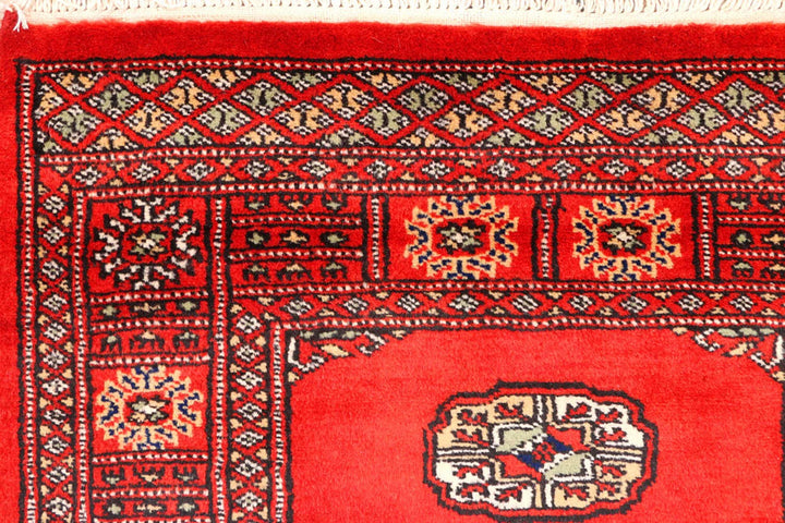 Red Pakistani Bokhara Rug 2' 8" x 12' Hand-Knotted | No. QA32867