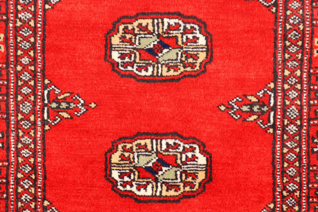 Red Pakistani Bokhara Rug 2' 8" x 12' Hand-Knotted | No. QA32867