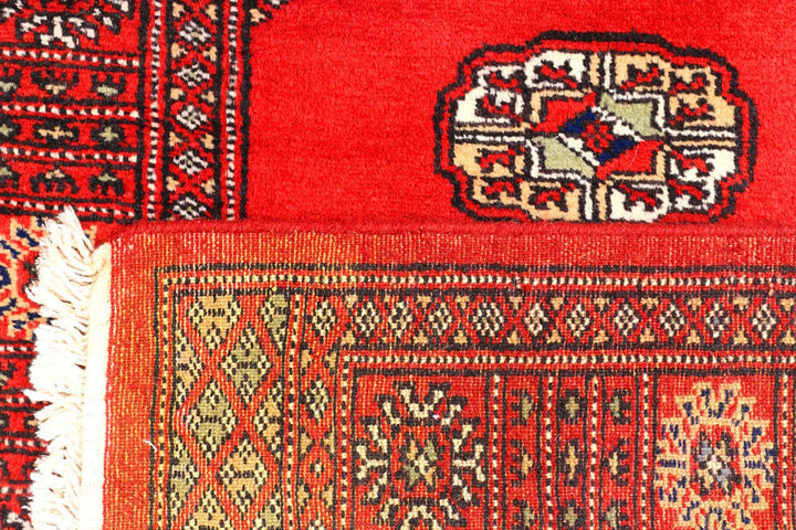 Red Pakistani Bokhara Rug 2' 8" x 12' Hand-Knotted | No. QA32867