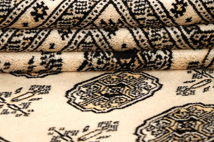 Brown Pakistani Bokhara Rug 6' 1" x 8' 11" Hand-Knotted | No. QA32910