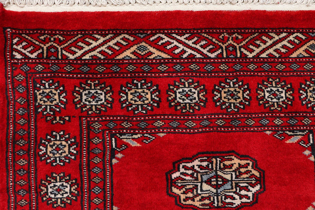 Red Pakistani Bokhara Rug 2' 4" x 8' 10" Hand-Knotted | No. QA33048