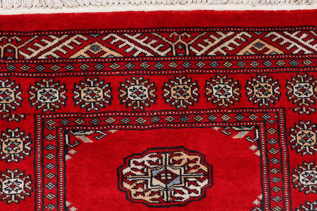 Red Pakistani Bokhara Rug 2' 4" x 8' 10" Hand-Knotted | No. QA33048
