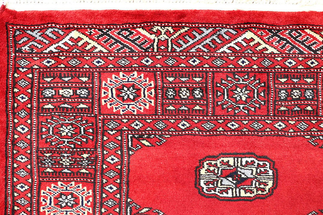 Red Pakistani Bokhara Rug 4' 2" x 6' Hand-Knotted | No. QA34386