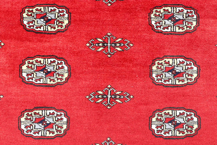 Red Pakistani Bokhara Rug 4' 2" x 6' Hand-Knotted | No. QA34386