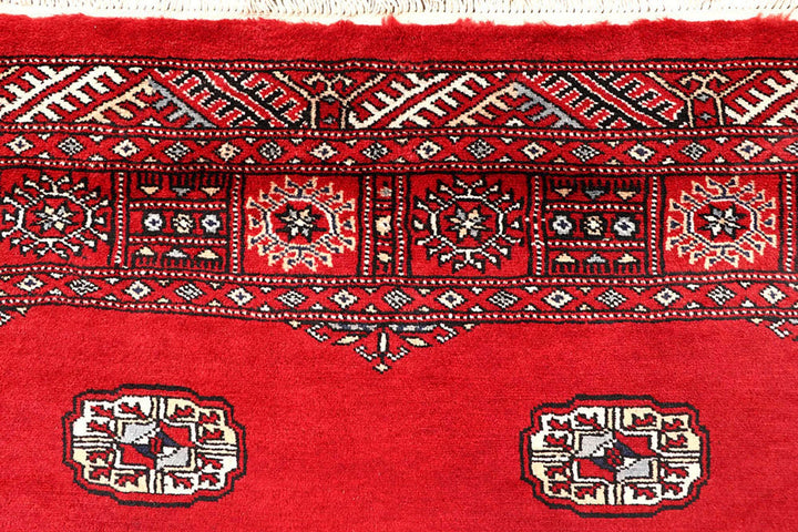 Red Pakistani Bokhara Rug 4' 1" x 6' 9" Hand-Knotted | No. QA34448