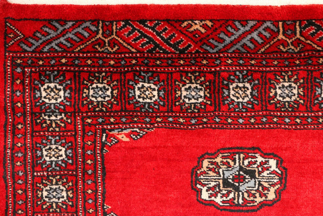 Dark Red Pakistani Bokhara Rug 2' 6" x 9' 4" Hand-Knotted | No. QA34732