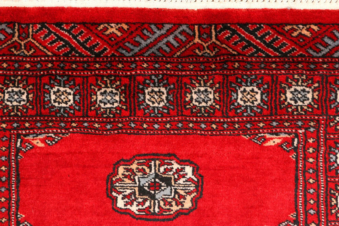 Dark Red Pakistani Bokhara Rug 2' 6" x 9' 4" Hand-Knotted | No. QA34732