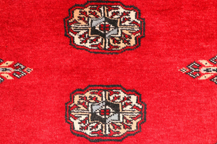 Dark Red Pakistani Bokhara Rug 2' 6" x 9' 4" Hand-Knotted | No. QA34732