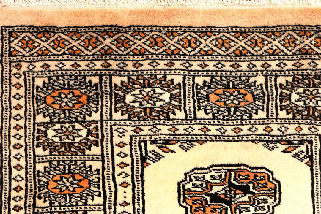 Ivory Pakistani Bokhara Rug 2' 6" x 10' 3" Hand-Knotted | No. QA34853