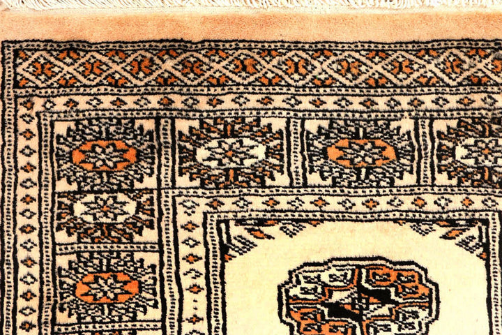 Ivory Pakistani Bokhara Rug 2' 6" x 10' 3" Hand-Knotted | No. QA34853