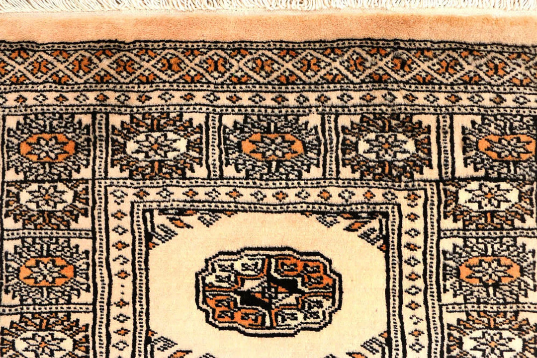 Ivory Pakistani Bokhara Rug 2' 6" x 10' 3" Hand-Knotted | No. QA34853
