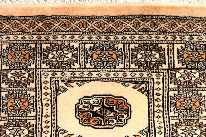 Ivory Pakistani Bokhara Rug 2' 6" x 10' 3" Hand-Knotted | No. QA34853