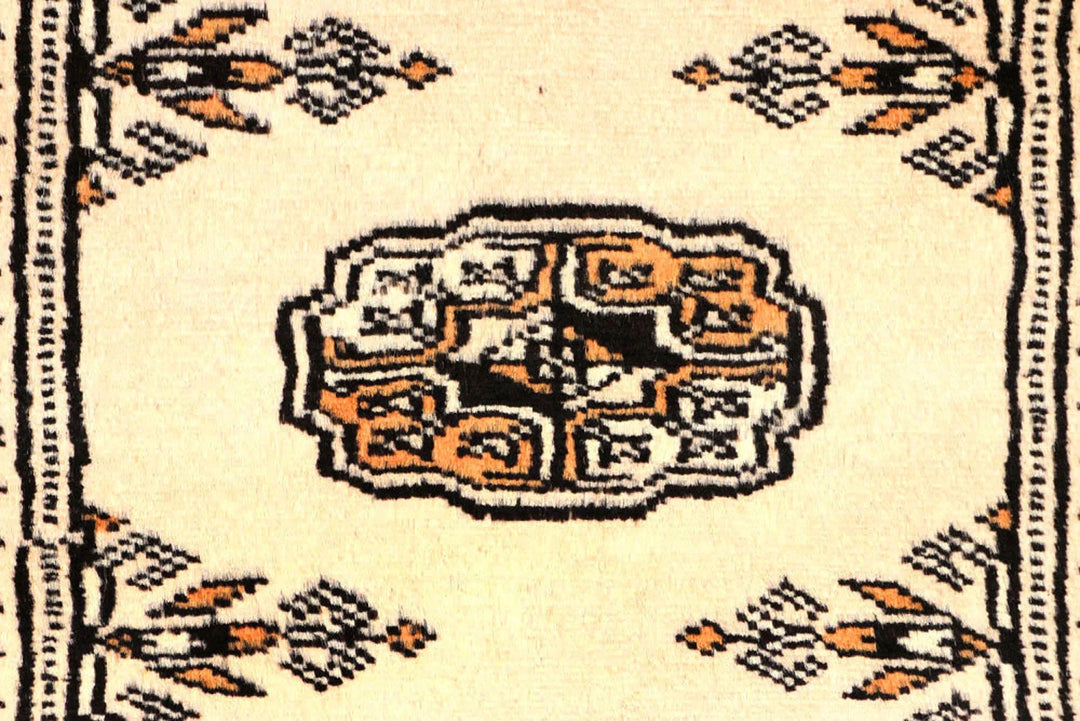 Ivory Pakistani Bokhara Rug 2' 6" x 10' 3" Hand-Knotted | No. QA34853