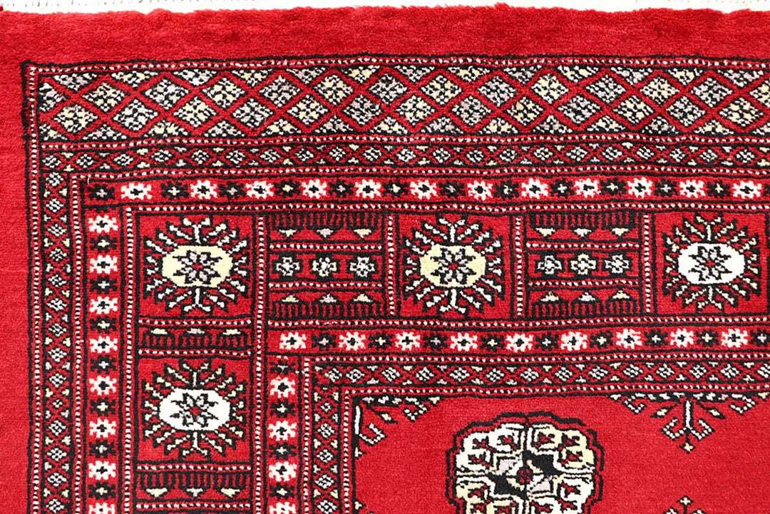 Firebrick Red Pakistani Bokhara Rug 5' 1" x 8' Hand-Knotted | No. QA34896