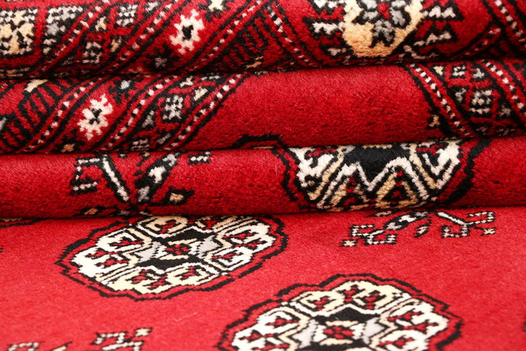 Firebrick Red Pakistani Bokhara Rug 5' 1" x 8' Hand-Knotted | No. QA34896