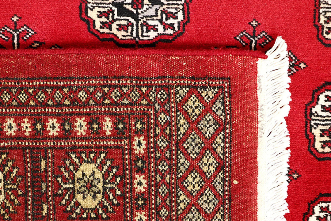 Firebrick Red Pakistani Bokhara Rug 5' 1" x 8' Hand-Knotted | No. QA34896