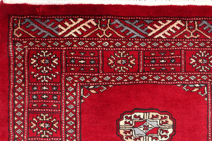 Dark Red Pakistani Bokhara Rug 2' 7" x 11' 11" Hand-Knotted | No. QA35322
