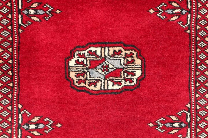 Dark Red Pakistani Bokhara Rug 2' 7" x 11' 11" Hand-Knotted | No. QA35322