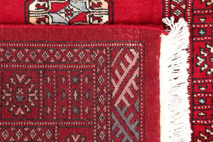 Dark Red Pakistani Bokhara Rug 2' 7" x 11' 11" Hand-Knotted | No. QA35322