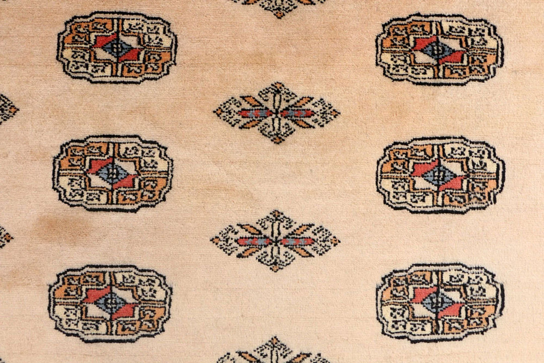 Brown Bokhara Rug 4' 2" x 5' 7" Hand-Knotted | No. QA35855