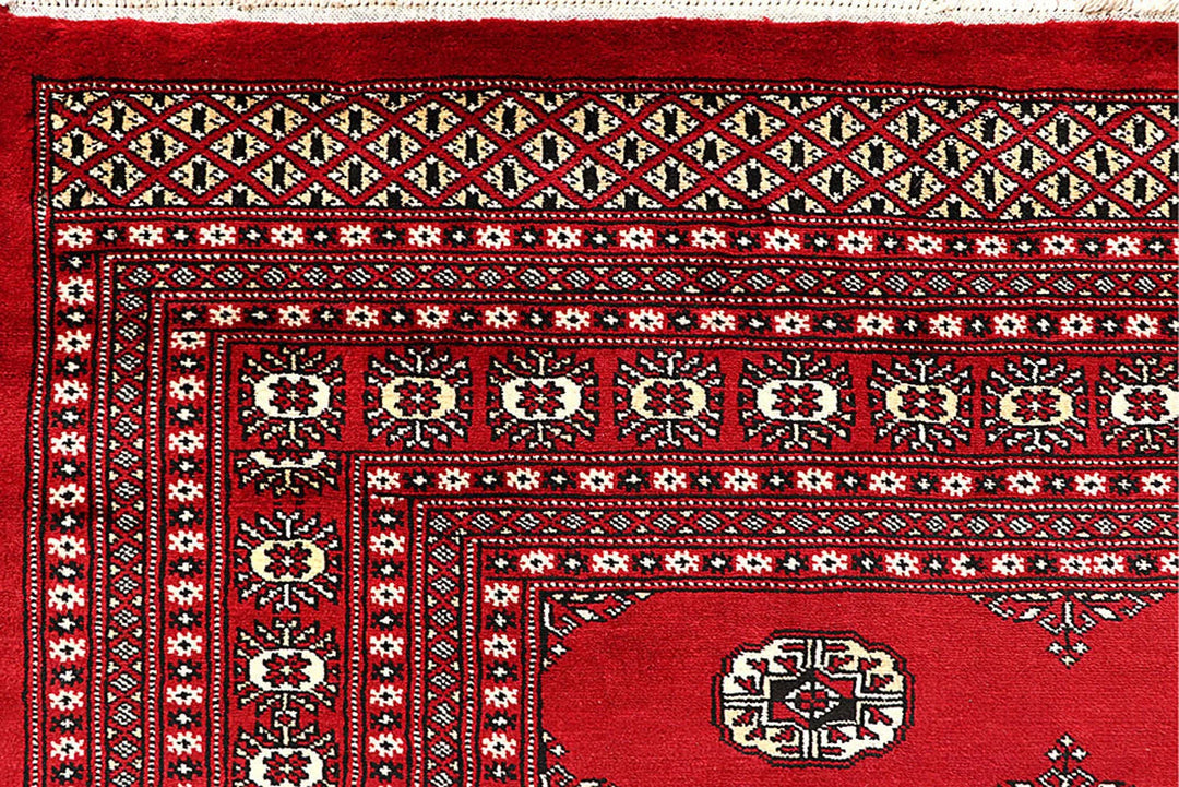Red Pakistani Bokhara Rug 9' 1" x 11' 9" Hand-Knotted | No. QA35870