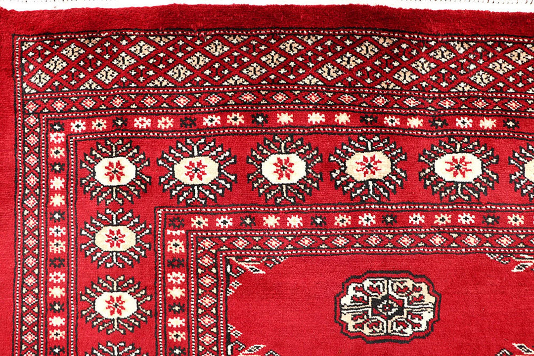 Firebrick Red Pakistani Bokhara Rug 4' 11" x 8' 2" Hand-Knotted | No. QA36451