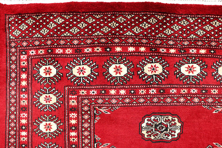 Firebrick Red Pakistani Bokhara Rug 4' 11" x 8' 2" Hand-Knotted | No. QA36451