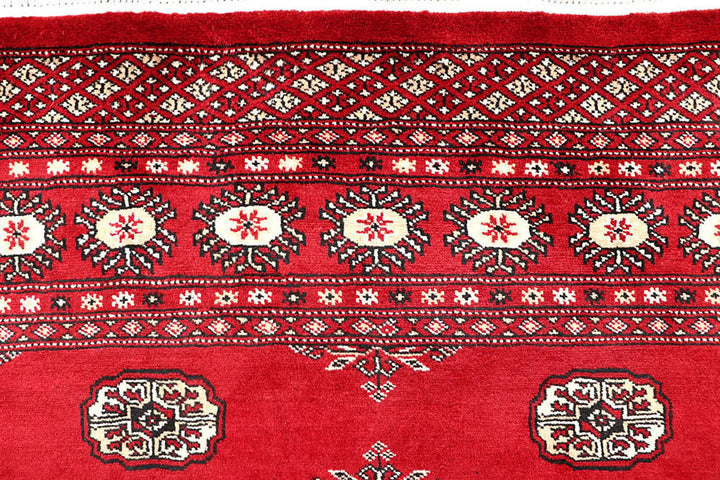 Firebrick Red Pakistani Bokhara Rug 4' 11" x 8' 2" Hand-Knotted | No. QA36451