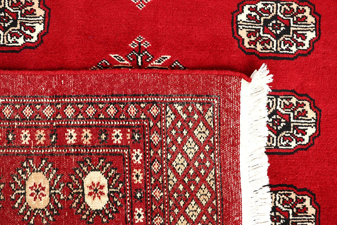 Firebrick Red Pakistani Bokhara Rug 4' 11" x 8' 2" Hand-Knotted | No. QA36451