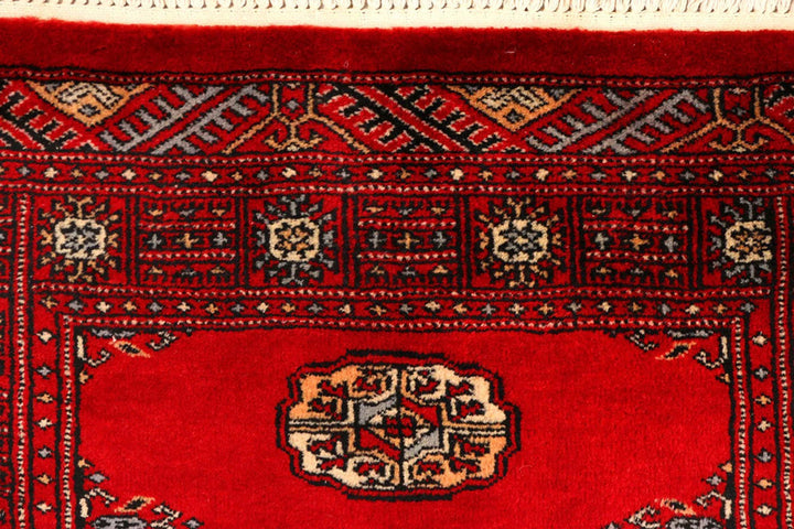Dark Red Pakistani Bokhara Rug 2' 6" x 9' 4" Hand-Knotted | No. QA36464
