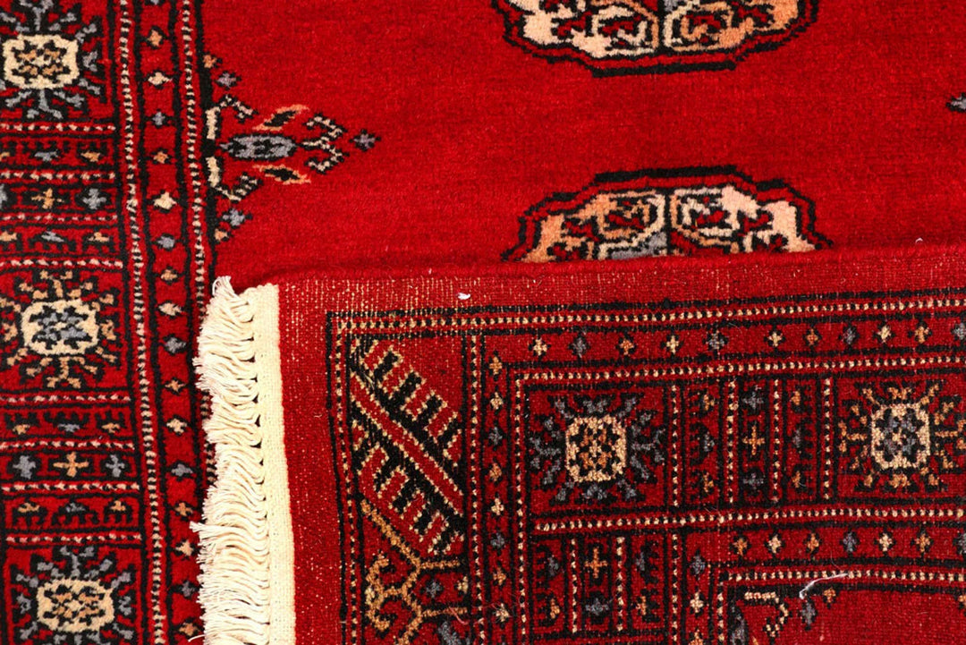 Dark Red Pakistani Bokhara Rug 2' 6" x 9' 4" Hand-Knotted | No. QA36464