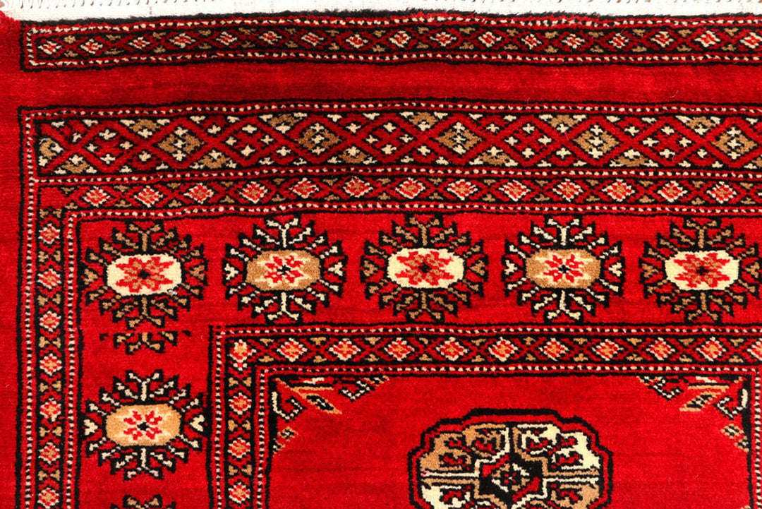 Dark Red Pakistani Bokhara Rug 2' 7" x 9' 8" Hand-Knotted | No. QA37834