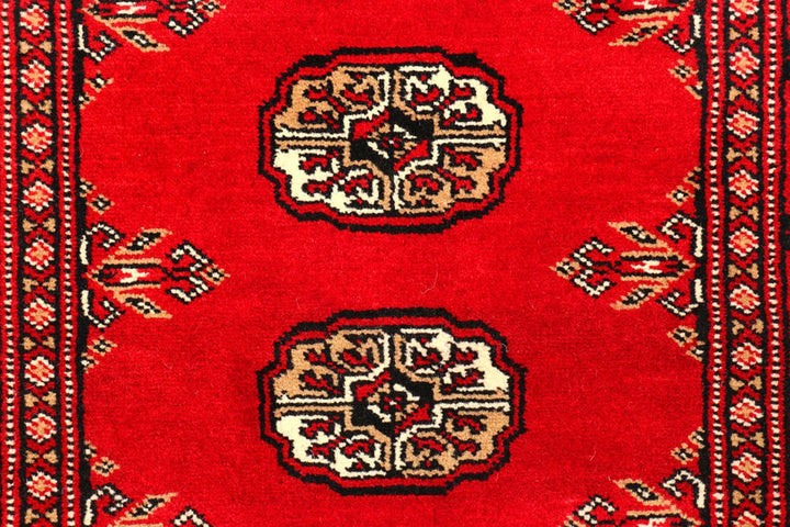 Dark Red Pakistani Bokhara Rug 2' 7" x 9' 8" Hand-Knotted | No. QA37834