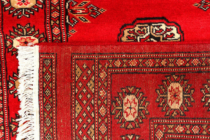 Dark Red Pakistani Bokhara Rug 2' 7" x 9' 8" Hand-Knotted | No. QA37834
