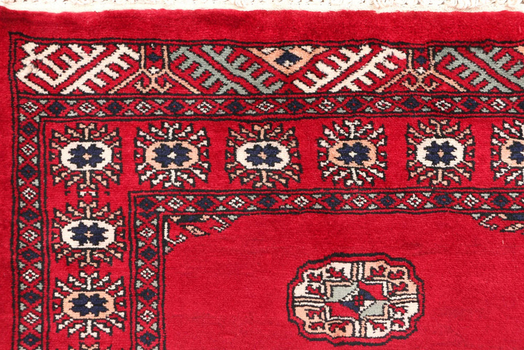 Dark Red Pakistani Bokhara Rug 2' 7" x 9' 9" Hand-Knotted | No. QA38126