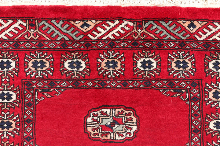 Dark Red Pakistani Bokhara Rug 2' 7" x 9' 9" Hand-Knotted | No. QA38126