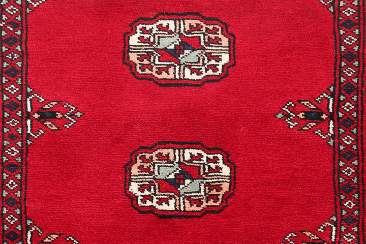 Dark Red Pakistani Bokhara Rug 2' 7" x 9' 9" Hand-Knotted | No. QA38126