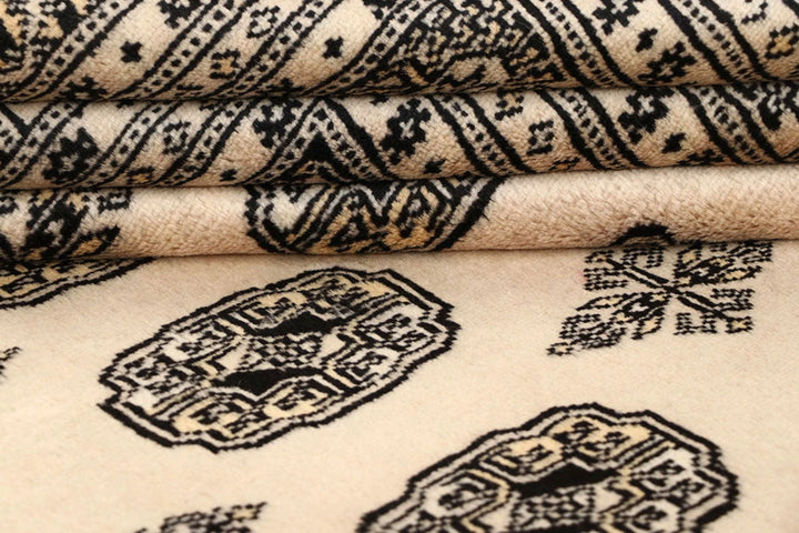 Brown Pakistani Bokhara Rug 6' 1" x 8' 11" Hand-Knotted | No. QA38645