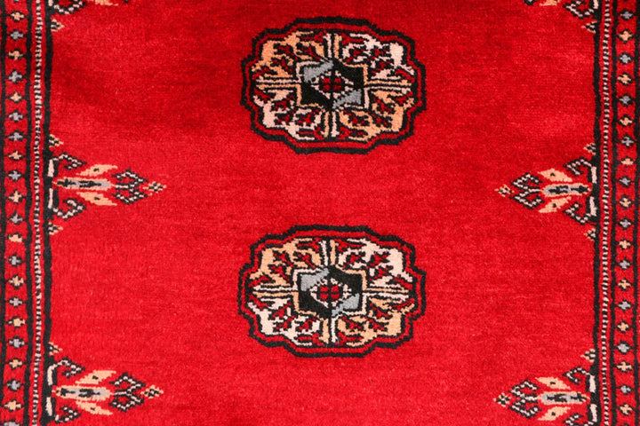 Red Pakistani Bokhara Rug 2' 6" x 9' 1" Hand-Knotted | No. QA38868