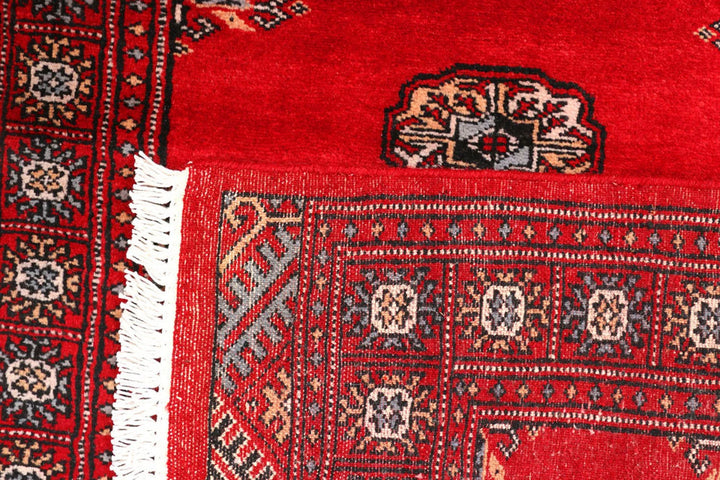 Red Pakistani Bokhara Rug 2' 6" x 9' 1" Hand-Knotted | No. QA38868