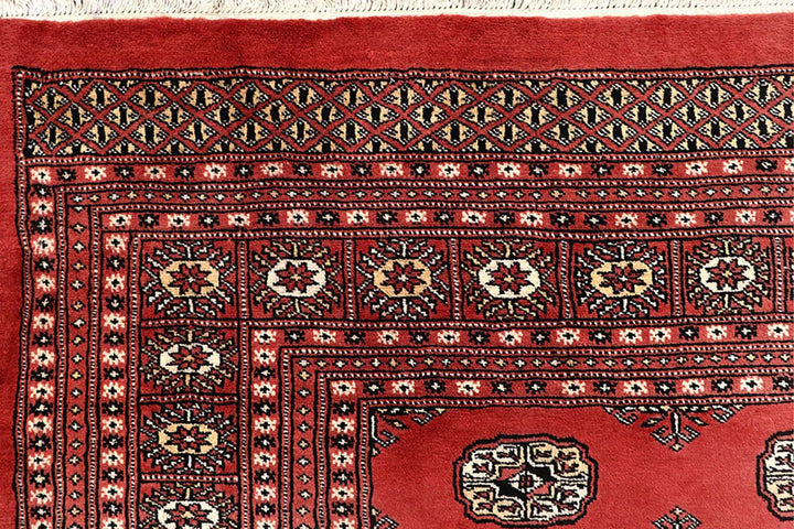 Salmon Pakistani Bokhara Rug 8' x 9'11" Hand-Knotted | No. QA39006