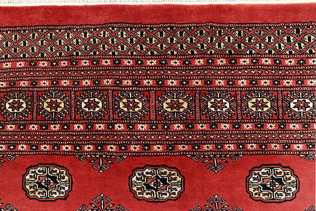 Salmon Pakistani Bokhara Rug 8' x 9'11" Hand-Knotted | No. QA39006