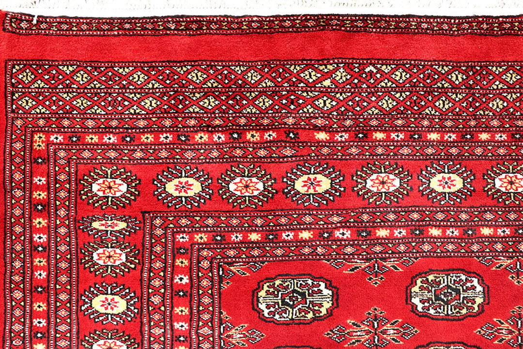 Crimson Pakistani Bokhara Rug 6' 5" x 8' 11" Hand-Knotted | No. QA39092