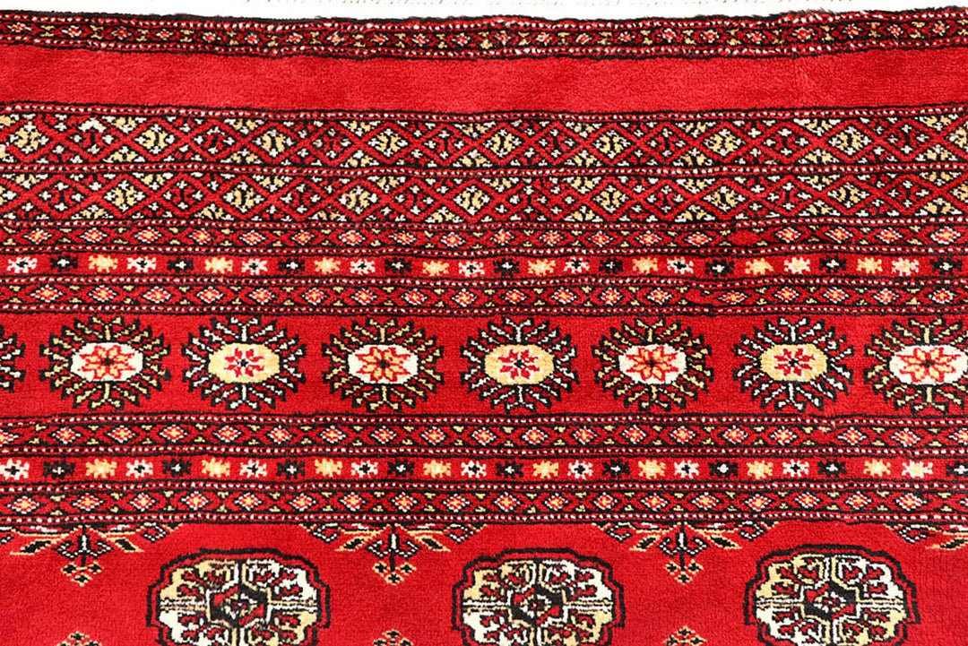Crimson Pakistani Bokhara Rug 6' 5" x 8' 11" Hand-Knotted | No. QA39092